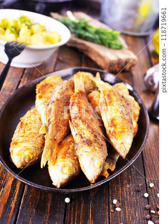Fried fish in flour and oil Fried fish in flour and oil 118719661