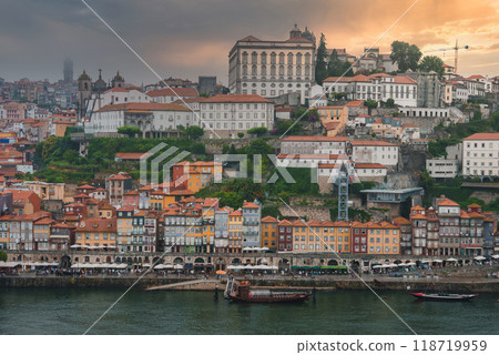 Experience the charm of Porto, Portugal, featuring the colorful Ribeira district, the historic Monastery of Serra do Pilar, and traditional Rabelo boats along the Douro River. 118719959