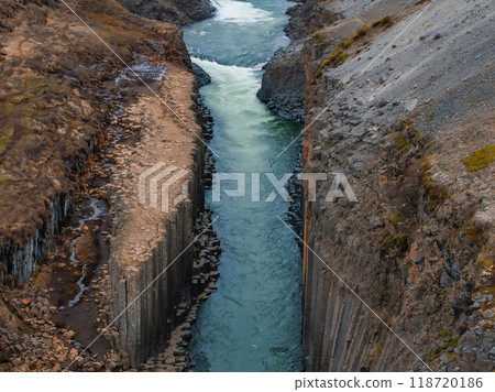 Aerial view of the Studlagil Canyon. Beautiful view of Jokulsa A Bru river. Superb outdoor scene of Iceland, Europe. Beauty of nature concept background. 118720186