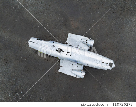 Aerial view of the Solheimasandur Plane Wreck in Iceland. Wrecked old plane Dakota on the black sand beach, south coast of Iceland 118720275