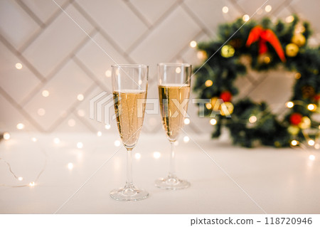 A close-up of a pinecone and a ball with a snowflake on a branch of a Christmas fir. A close-up of a pinecone and a ball with a snowflake on a branch of a Christmas fir. 118720946