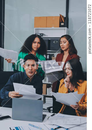 Stress, business people and employee frustrated with multitasking, pressure or overworked by team in chaos with paperwork. Anxiety, headache and worker overwhelmed by group and burnout in crisis Stress, business people and employee frustrated with multitasking, pressure or overworked by team in chaos with paperwork. Anxiety, headache and worker overwhelmed by group and burnout in crisis 118721072