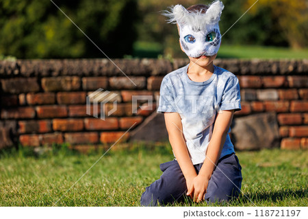 Cute young little kid girl wear cat furry mask enjoy have fun playing outdoors in forest street park. Children therian wild animal character trendy fan culture. Teenager social expression hobby Cute young little kid girl wear cat furry mask enjoy have fun playing outdoors in forest street park. Children therian wild animal character trendy fan culture. Teenager social expression hobby 118721197