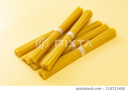 Spaghettini on a yellow background 118721400