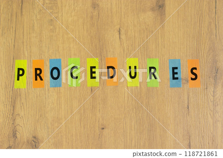 Procedures symbol. Concept word Procedures on beautiful colored paper. Beautiful wooden background. Business procedures concept. Copy space. Procedures symbol. Concept word Procedures on beautiful colored paper. Beautiful wooden background. Business procedures concept. Copy space. 118721861