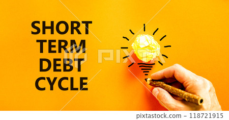 Short term debt cycle symbol. Concept words Short term debt cycle on beautiful orange paper. Beautiful orange background. Businessman hand. Business Short term debt cycle concept. Copy space 118721915