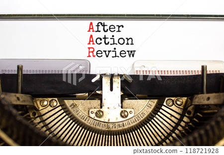AAR After action review symbol. Concept words AAR After action review typed on beautiful old retro typewriter. Beautiful white background. Business AAR after action review concept. Copy space. AAR After action review symbol. Concept words AAR After action review typed on beautiful old retro typewriter. Beautiful white background. Business AAR after action review concept. Copy space. 118721928