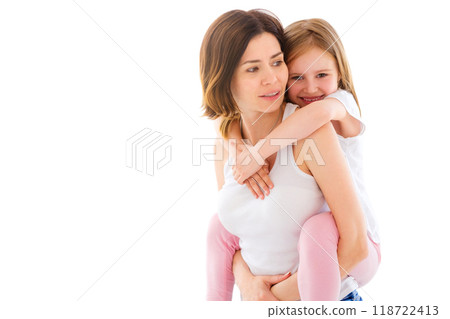 Mother with her little daughter girl playing isolated on a white background Mother with her little daughter girl playing isolated on a white background 118722413