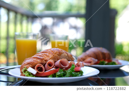 Breakfast croissant sandwiches served wooden board Croissant with meat. tasty croissant sandwiches on white background Breakfast croissant sandwiches served wooden board Croissant with meat. tasty croissant sandwiches on white background 118722882