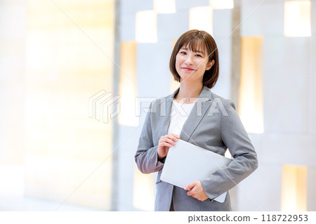 A woman with a laptop computer. Photo courtesy of Denpa Gakuen, Tokyo Electronics College. A woman with a laptop computer. Photo courtesy of Denpa Gakuen, Tokyo Electronics College. 118722953