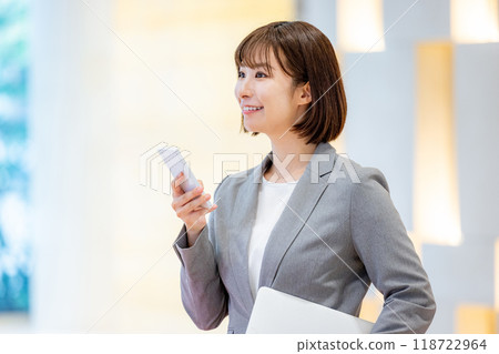 OL, company employee, company, businesswoman with smartphone. Photo courtesy of Denpa Gakuen, Tokyo Electronics College. OL, company employee, company, businesswoman with smartphone. Photo courtesy of Denpa Gakuen, Tokyo Electronics College. 118722964