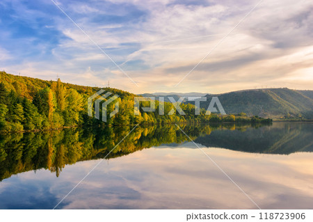 autumn landscape with lake in mountains. romania, europe. scenery in fall colors reflecting in the calm water at sunset autumn landscape with lake in mountains. romania, europe. scenery in fall colors reflecting in the calm water at sunset 118723906