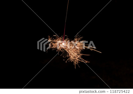 Orange sparkler fireworks Orange sparkler fireworks 118725422