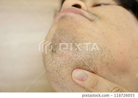 A Japanese man in his 30s who is concerned about his beard A Japanese man in his 30s who is concerned about his beard 118726055