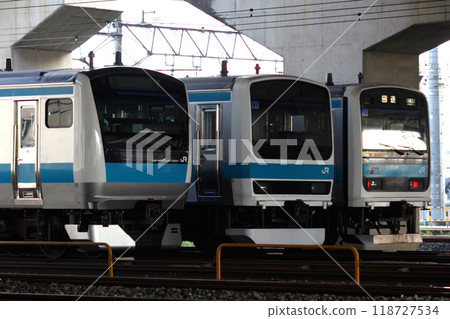Old and new Keihin-Tohoku Line trains parked at Urawa Depot Old and new Keihin-Tohoku Line trains parked at Urawa Depot 118727534