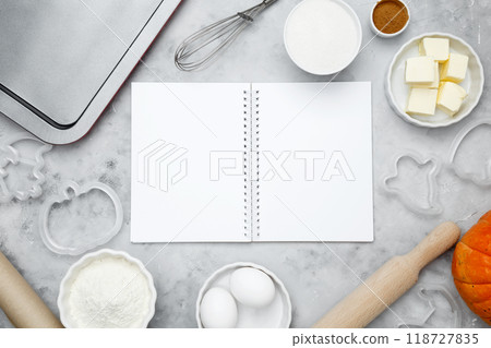 Ingredients for baking cookies for Halloween, notepad mock-up for writing down the recipe. Seasonal autumn baking Ingredients for baking cookies for Halloween, notepad mock-up for writing down the recipe. Seasonal autumn baking 118727835