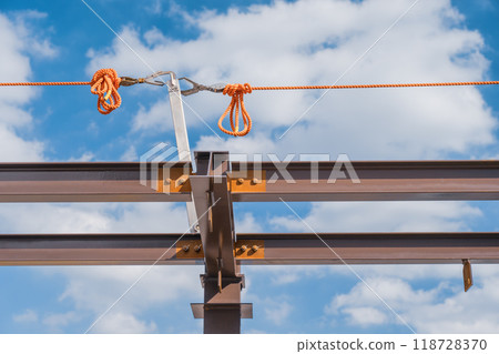 Blue sky and a lifeline post installed on a steel beam Blue sky and a lifeline post installed on a steel beam 118728370