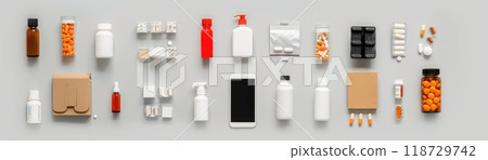 Various household products and packaging on a grey background. 118729742