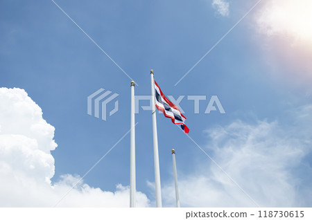Thailand flag isolated on the blue sky with clipping path. close up waving flag of Thailand. flag symbols of Thailand. 118730615