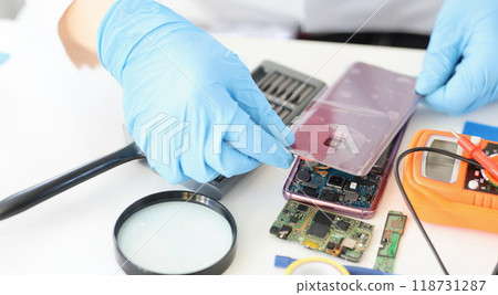 Male put back panel on mobile phone cover wire connections 118731287