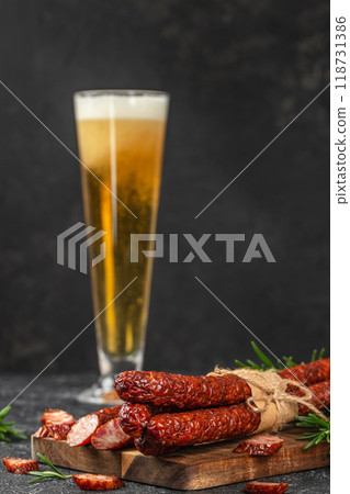 Beer with thin dry smoked sausages, Beer snack. copy space 118731386