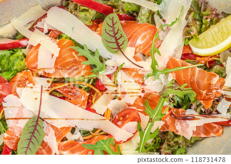 Fresh salmon and vegetable salad. Food recipe background. Close up. top view Fresh salmon and vegetable salad. Food recipe background. Close up. top view 118731478