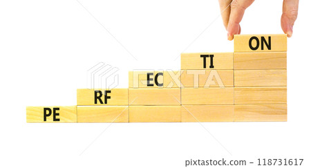 Perfection symbol. Concept word Perfection on beautiful wooden blocks. Businessman hand. Beautiful white background. Business perfection concept. Copy space. Perfection symbol. Concept word Perfection on beautiful wooden blocks. Businessman hand. Beautiful white background. Business perfection concept. Copy space. 118731617