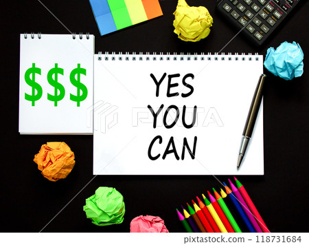 Motivational Yes you can symbol. Concept words Yes you can on beautiful white note. Beautiful black background. Black pen. Calculator. Business motivational and Yes you can concept. Copy space Motivational Yes you can symbol. Concept words Yes you can on beautiful white note. Beautiful black background. Black pen. Calculator. Business motivational and Yes you can concept. Copy space 118731684