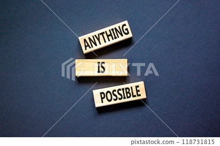 Anything is possible symbol. Concept words Anything is possible on beautiful wooden blocks. Beautiful black table black background. Business anything possible concept. Copy space. 118731815