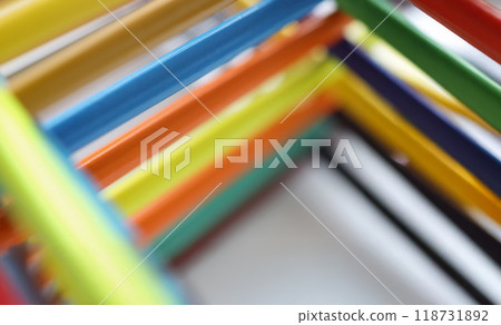 Pyramid shape made with some different colored wood pencil crayons 118731892