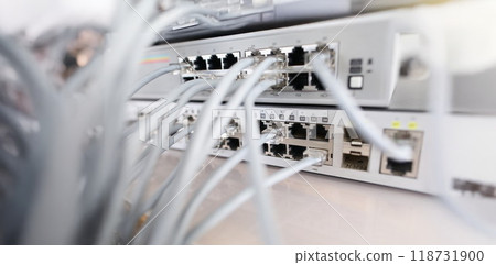 Set of cable network connected to internet switch servers in center 118731900