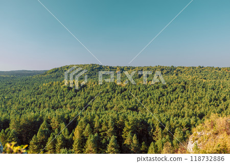 Panoramic mountain view of Poland national park, forest landscape near Mirow Castle. Sunny day at fall season. Hiking in nature. High quality FullHD footage Panoramic mountain view of Poland national park, forest landscape near Mirow Castle. Sunny day at fall season. Hiking in nature. High quality FullHD footage 118732886