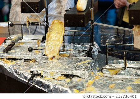 delicious wheel of raclette cheese cutting edge delicious wheel of raclette cheese cutting edge 118736401