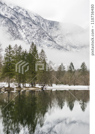 Tranquil winter lake in the mountains Tranquil winter lake in the mountains 118736480