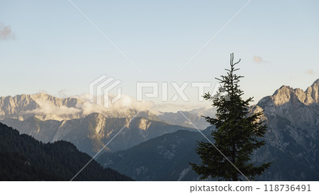 Beautiful view of high Julian Alps lit by the evening sun 118736491