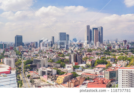 Panoramic view of Mexico City from above, showcasing the sprawling urban landscape, iconic landmarks, and vibrant culture. Cityscape, travel, and architecture concept Panoramic view of Mexico City from above, showcasing the sprawling urban landscape, iconic landmarks, and vibrant culture. Cityscape, travel, and architecture concept 118737781