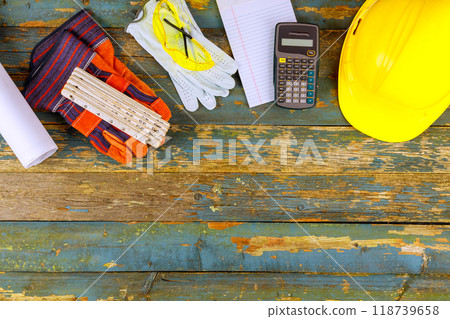 Rustic wooden background with safety gear celebrates Labor Day at United States of America Rustic wooden background with safety gear celebrates Labor Day at United States of America 118739658