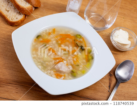 Rassolnik with sour pickles and pearl barley 118740539