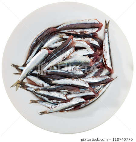 Raw anchovy fish served on plate 118740770
