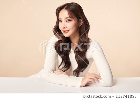 Beautiful young asian woman with clean fresh skin on beige background, Face care, Facial treatment, Cosmetology, beauty and spa, Asian women portrait. 118741855