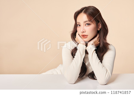 Beautiful young asian woman with clean fresh skin on beige background, Face care, Facial treatment, Cosmetology, beauty and spa, Asian women portrait. 118741857