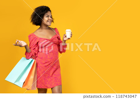 Young girl with shopping bags in her hands Young girl with shopping bags in her hands 118743047