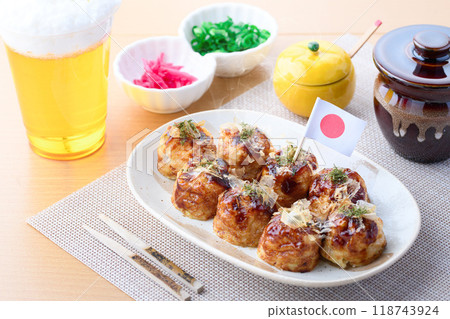 Takoyaki served on a plate 118743924