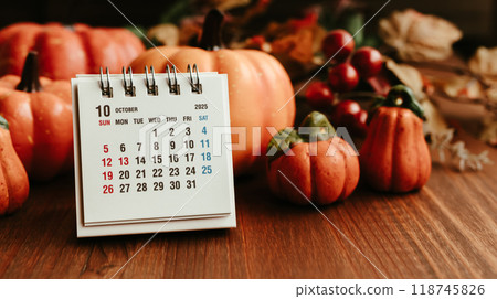 October 2025 calendar with autumn pumpkins and plants October 2025 calendar with autumn pumpkins and plants 118745826