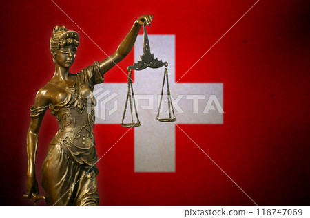 Lady Justice before a flag of Switzerland Lady Justice before a flag of Switzerland 118747069