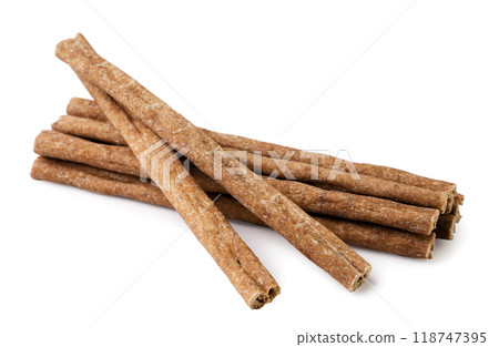 Pet food sticks close-up on a white. Isolated Pet food sticks close-up on a white. Isolated 118747395