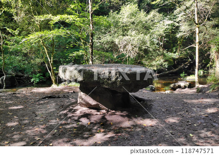 The Round table at the Fairies' pond in the Huelgoat forest The Round table at the Fairies' pond in the Huelgoat forest 118747571