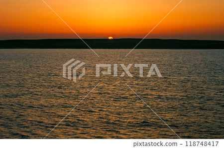 Red sunset over the Red Sea off the coast of Egypt Red sunset over the Red Sea off the coast of Egypt 118748417