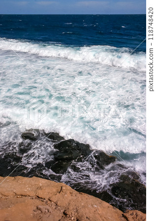 Storm off the steep shore of Big Brother Island, Red Sea, Egypt 118748420
