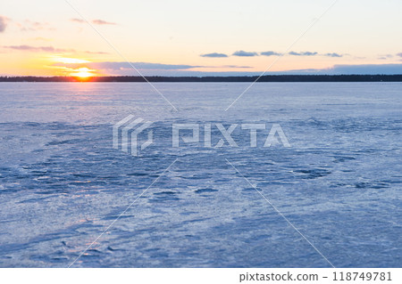Landscape with frozen Baltic sea at sunset. Natural winter background 118749781